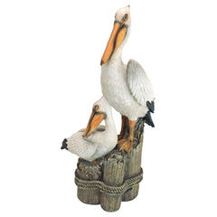 Design Toscano front view pelican statue showing coastal charm and durability