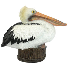 Design Toscano pelican displayed on a patio illustrating outdoor decorative benefit