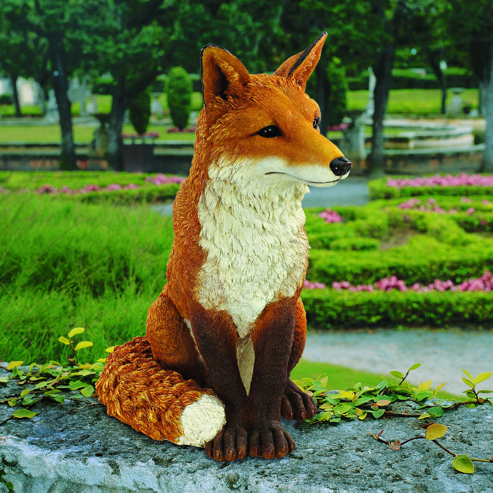 Design Toscano Simon fox next to ruler showing 18-inch height for scale