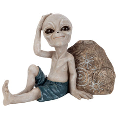 Design Toscano front view showing surfer alien statue adding quirky charm