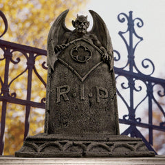 Design Toscano close-up of vampire wings and facial detail highlighting sculpted texture