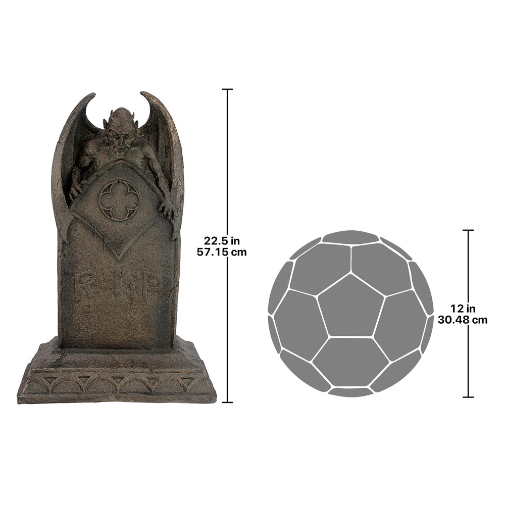 Design Toscano tombstone on porch with lighting showing dramatic Halloween ambiance