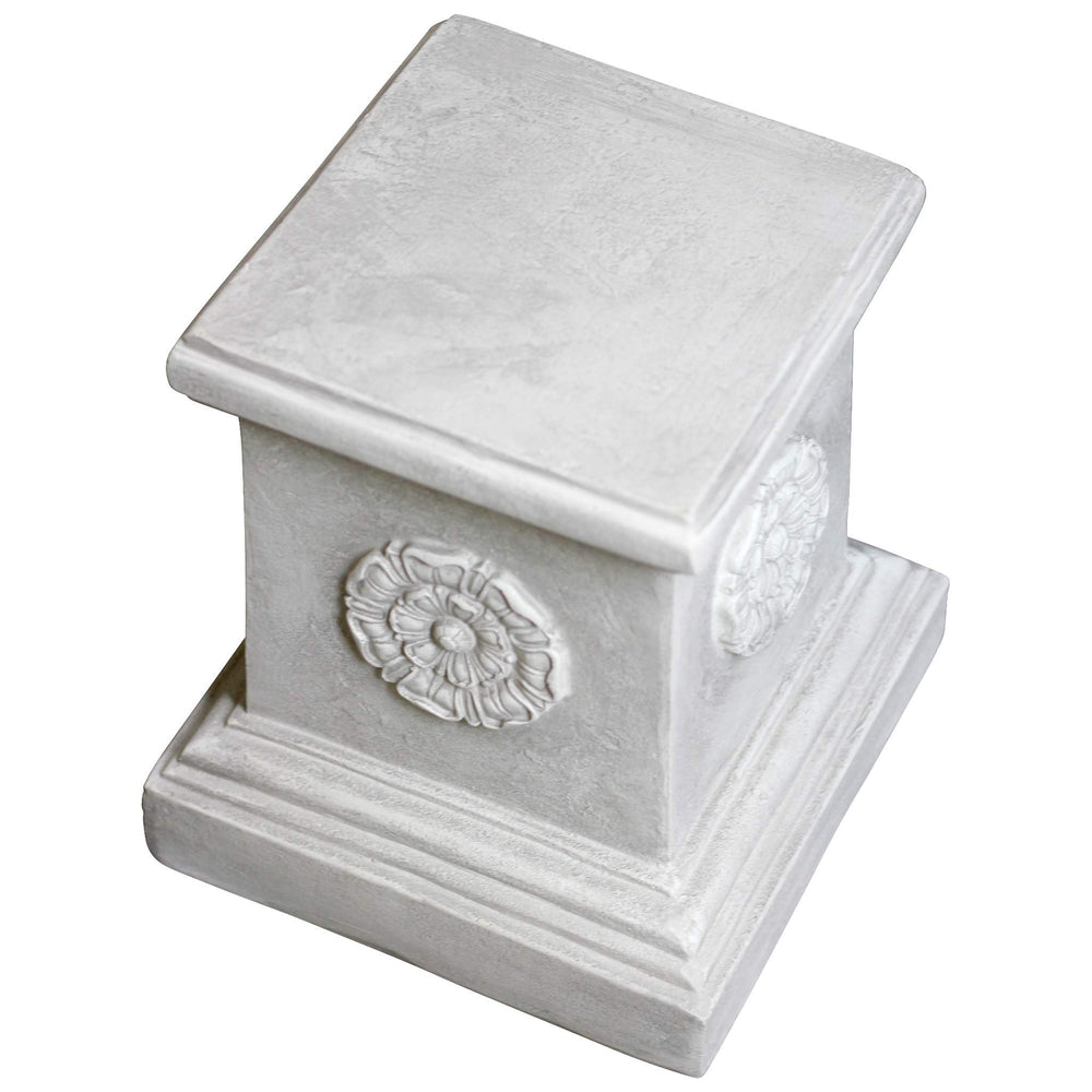 Design Toscano plinth with statue in garden setting creating a focal point benefit