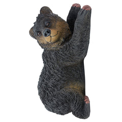 Design Toscano Yonva front view showing lifelike climbing pose and charm