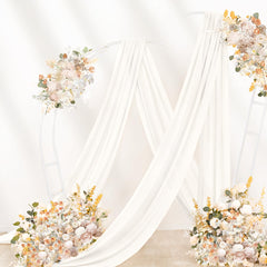 DeZerlor installed full arch backdrop demonstrating elegant event transformation