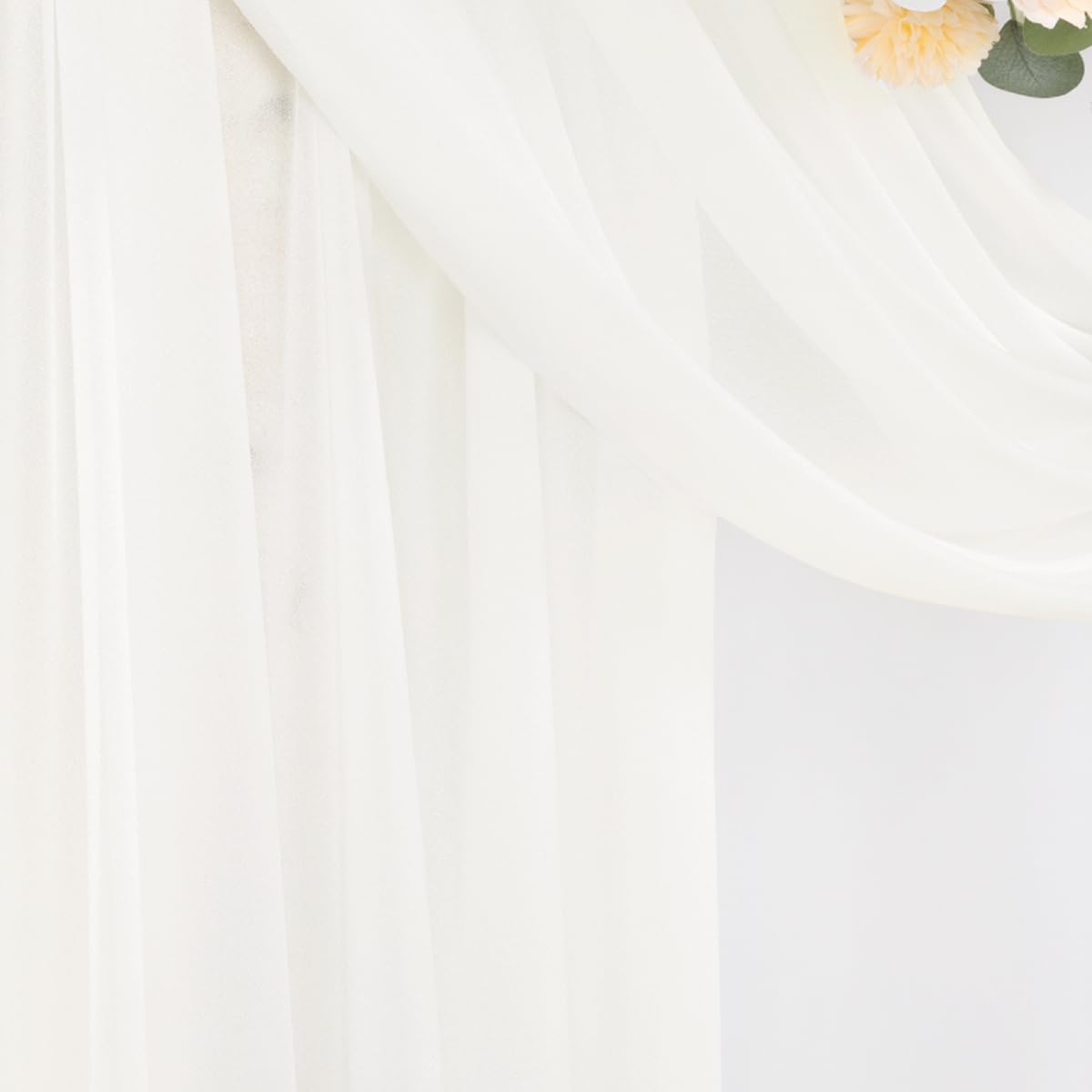 DeZerlor drapes styled with flowers and pearls showing customization possibilities