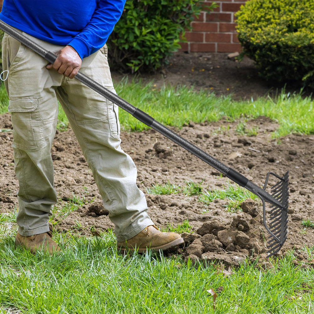 DIIG rake beside hands for scale illustrating 77-inch reach and ergonomic control