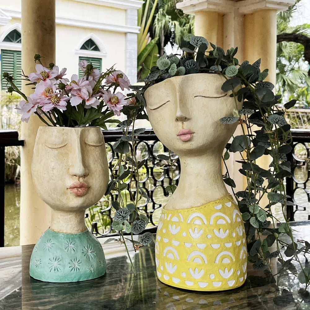 DiliComing face planter used as a vase with dried flowers showing multiuse styling benefit