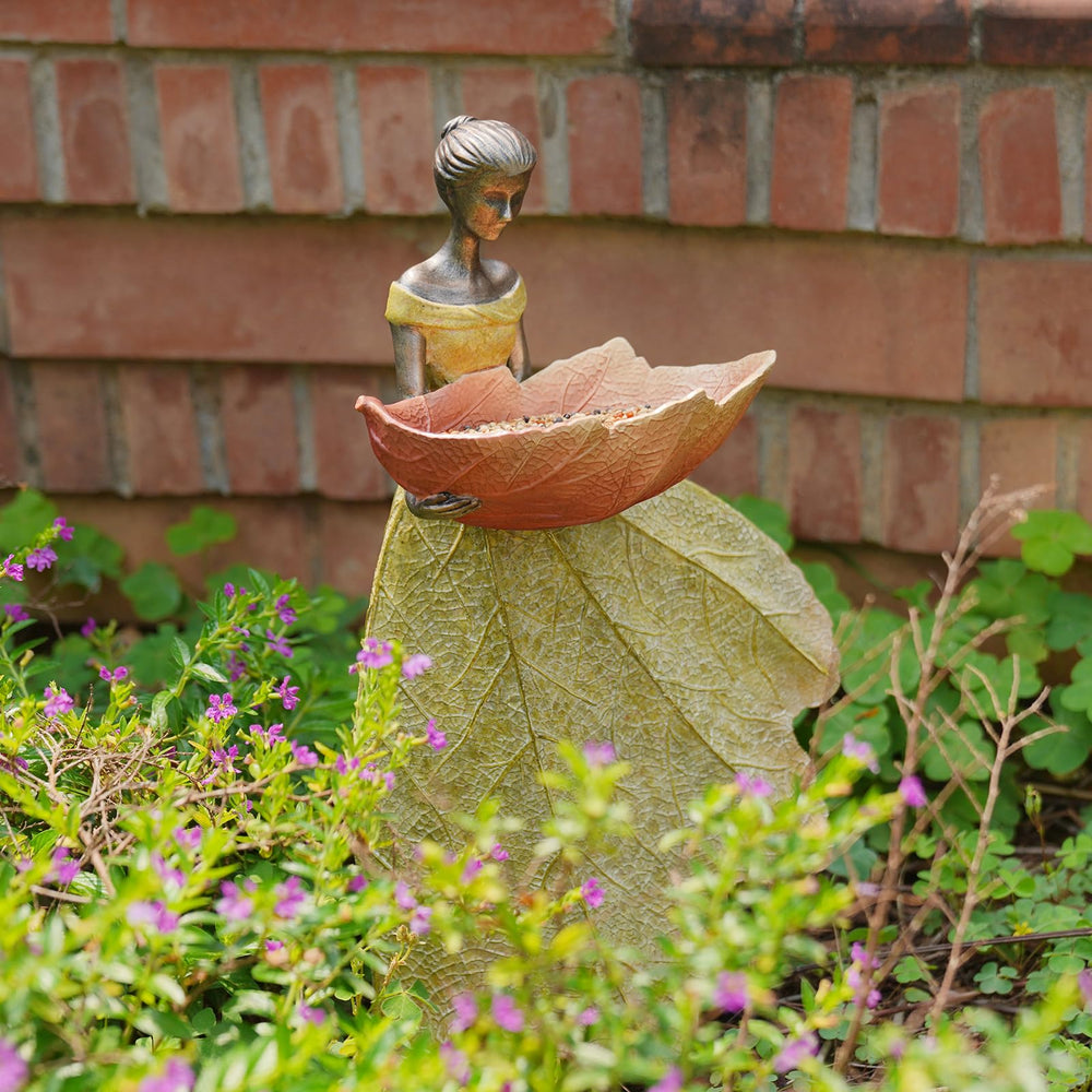 DiliComing placed in garden bed among plants, enhances outdoor seasonal décor