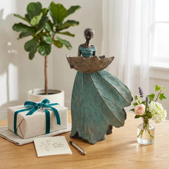DiliComing fairy placed in flowerbed showing scale and garden integration