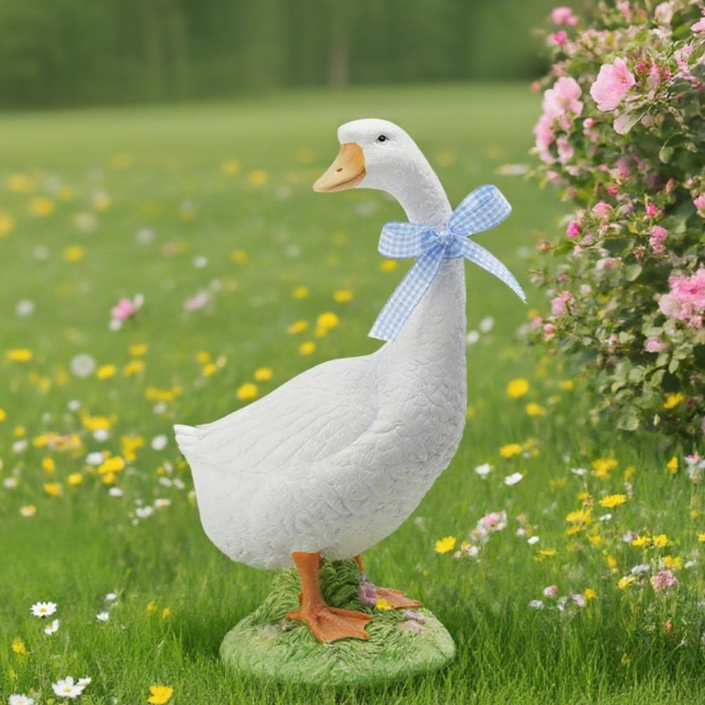 DiliComing goose sitting on porch step demonstrating easy placement