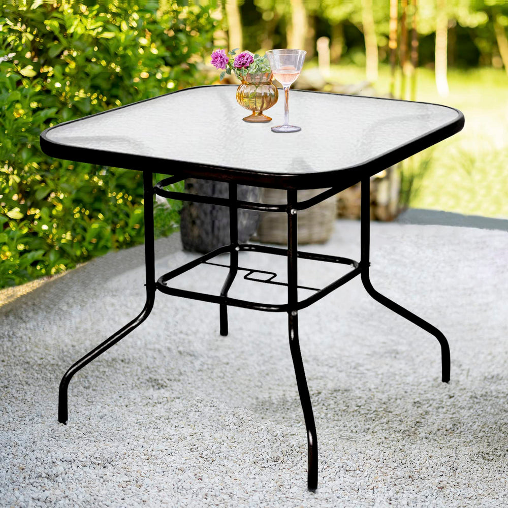DIMAR GARDEN front view showing black glass top and modern silhouette benefit durable style