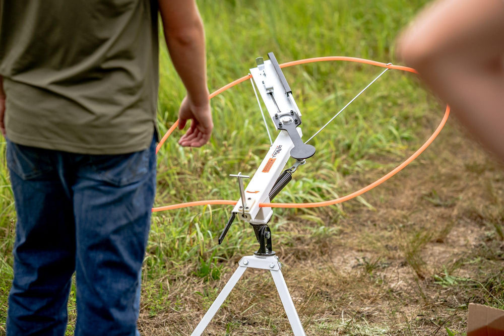 Do All Outdoors trap launching a clay in mid-air for realistic practice benefit
