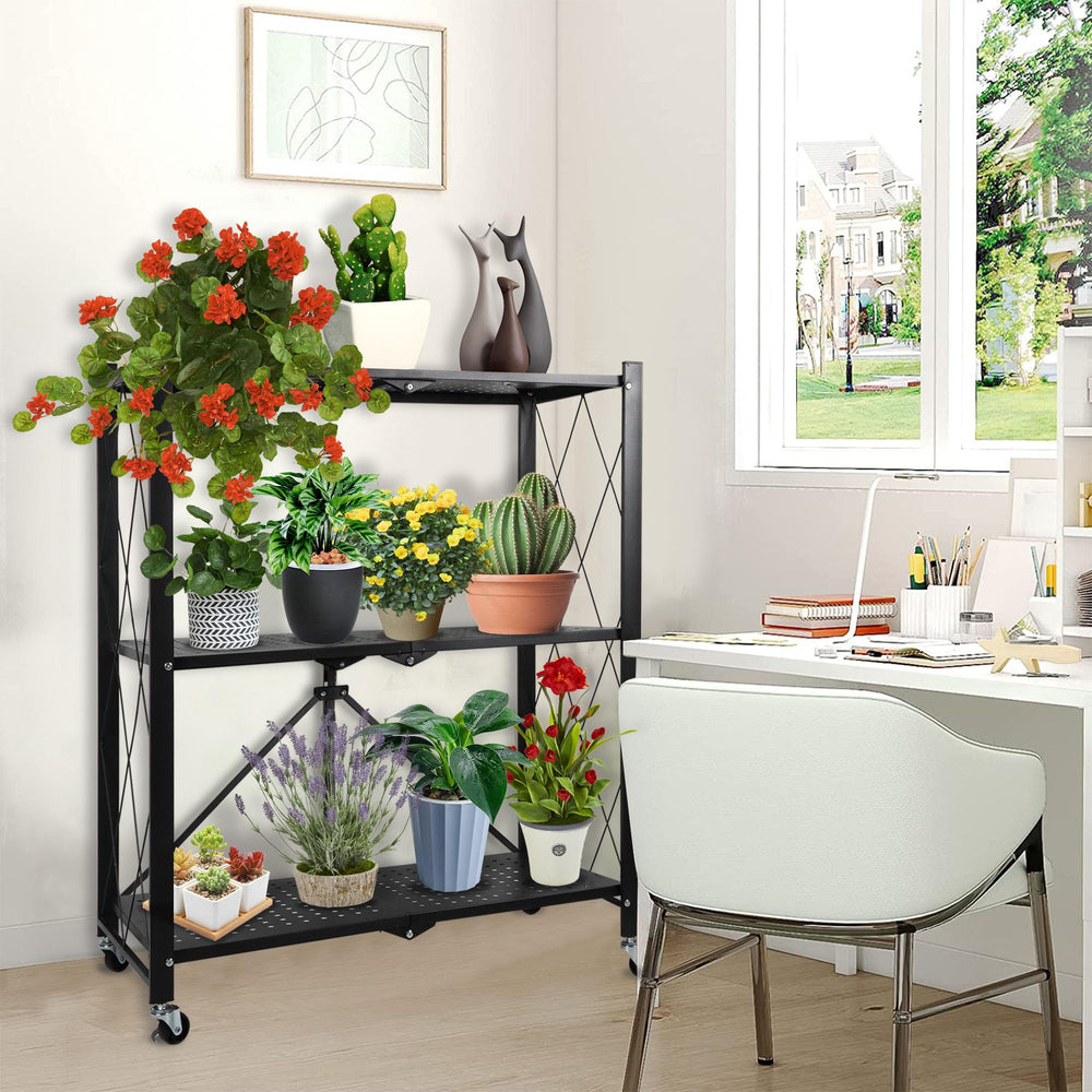 DOBEGARDEN folded rack against wall illustrating compact storage benefit