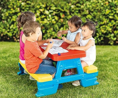 DOLU picnic table in use outdoors showing durable weatherproof play