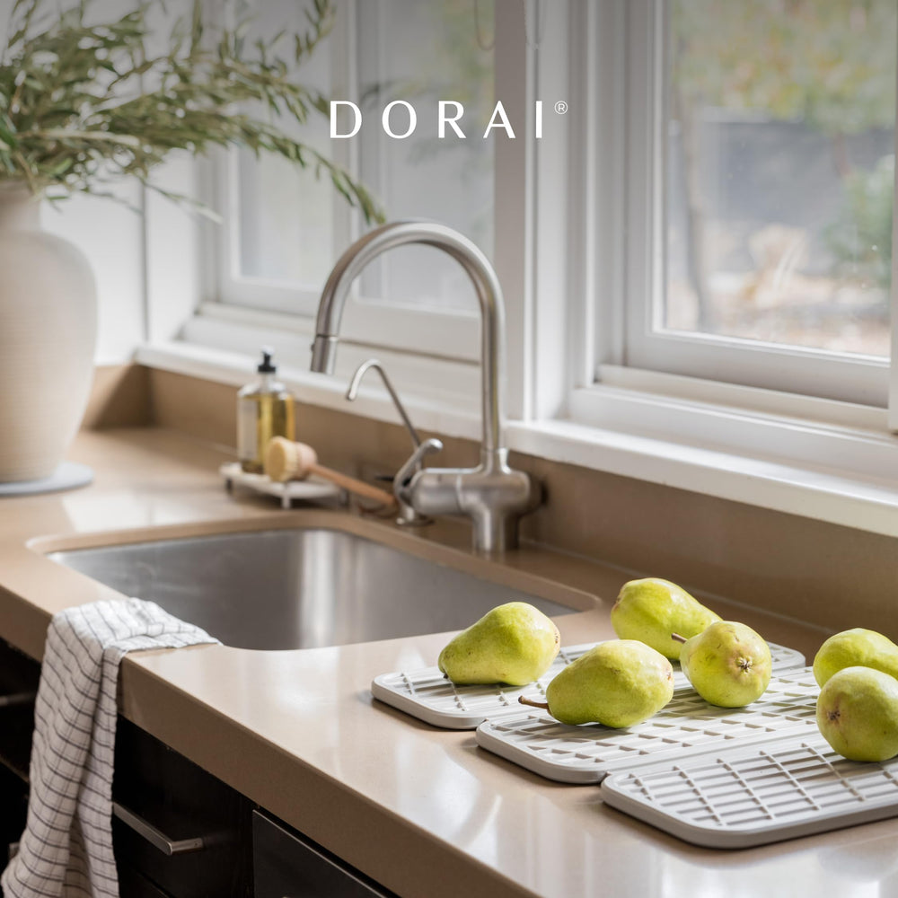 Dorai pair of trays on floor protecting hardwood from runoff