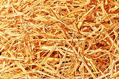 Double F Farms front packaging showing compressed 8 lb straw bale and brand label benefits