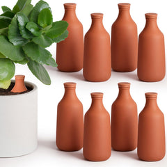 DoubleFill front view of eight terracotta ollas showing garden-ready set and convenience