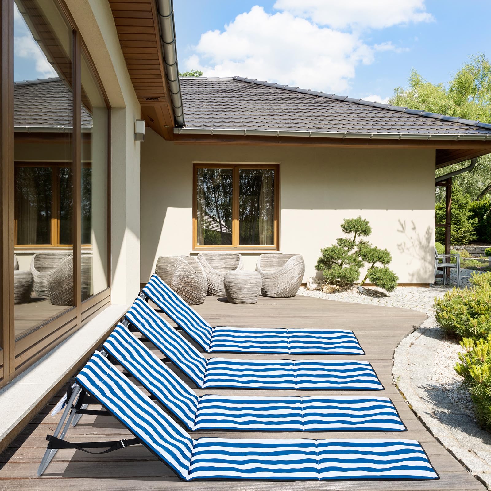 DoubleFill lifestyle scene of four loungers on beach for family relaxation