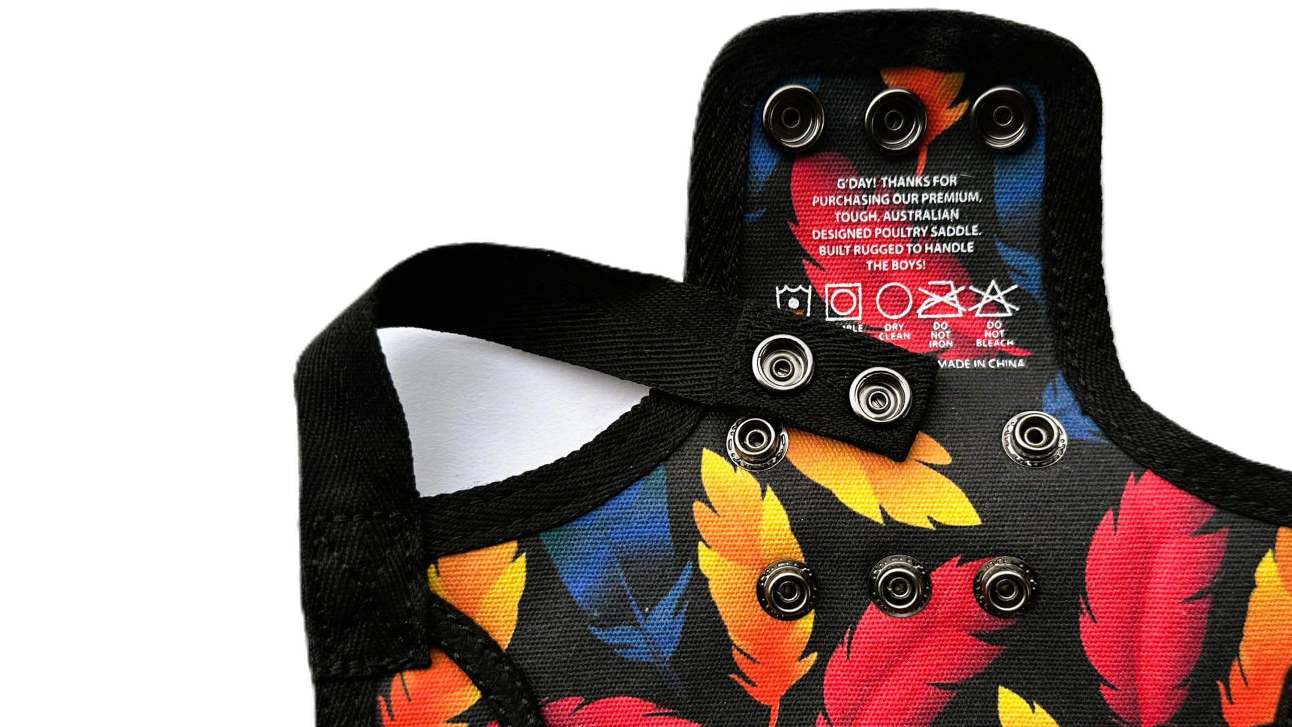 DOWN UNDER OUTDOORS strap and copper snap detail showing secure fastening and adjustable fit benefit
