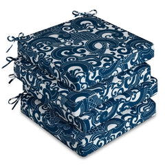 downluxe front view of four blue carp cushions showing design and set look