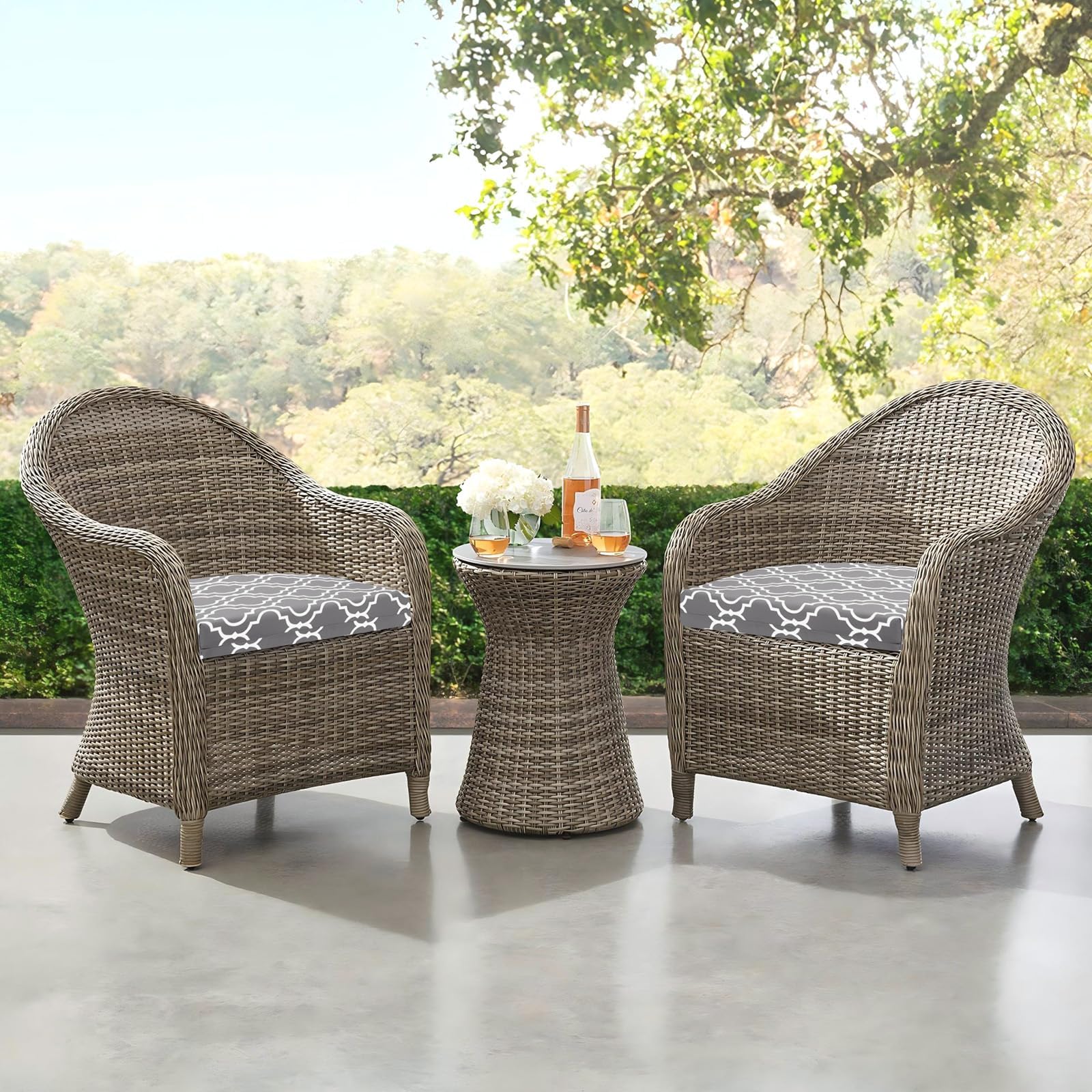 downluxe lifestyle image on a balcony set illustrating coordinated outdoor seating that enhances small spaces
