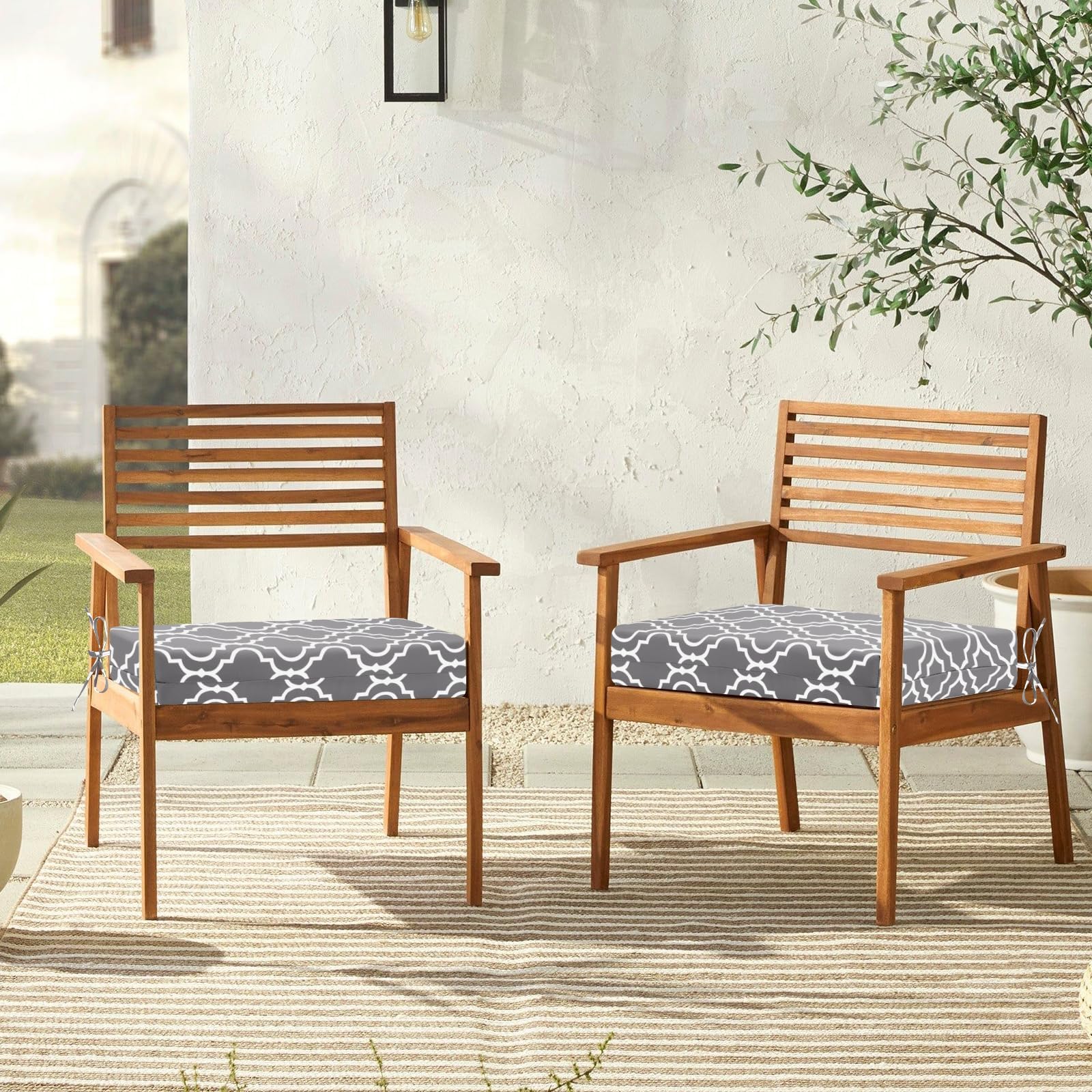 downluxe lifestyle scene of outdoor dining with cushions enhancing comfort and curb appeal