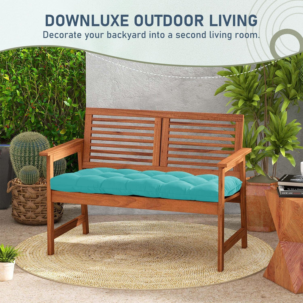 downluxe cushion on porch swing with reader showing cozy outdoor relaxation benefit