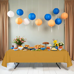 Dozobeede gold tablecloth laid flat on rectangle table protecting surface