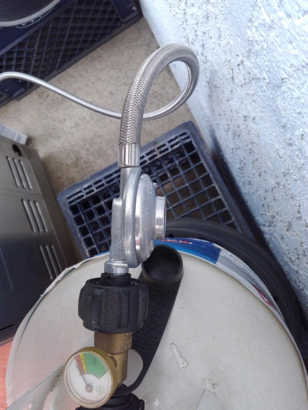DOZYANT 12-foot hose laid alongside tape measure showing generous reach