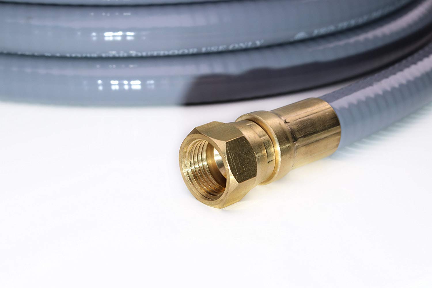 DOZYANT hose next to ruler showing 24-foot length for placement planning
