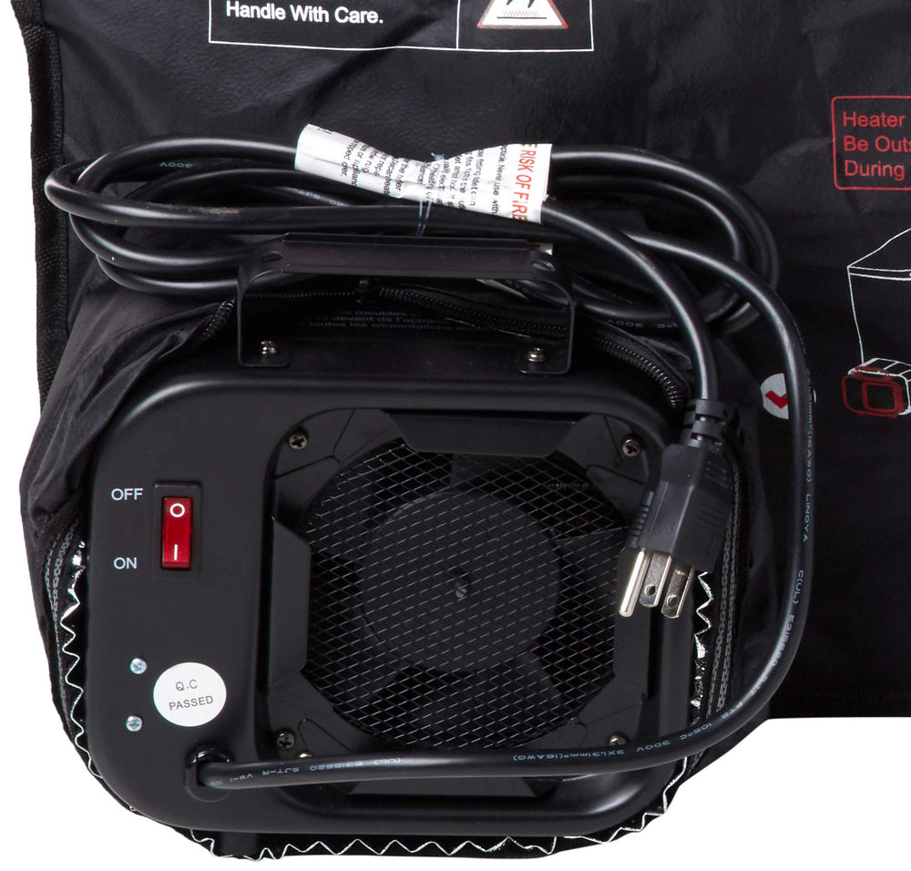 DR. INFRARED HEATER tent in bedroom with luggage and clothes inside, showing convenient at-home use