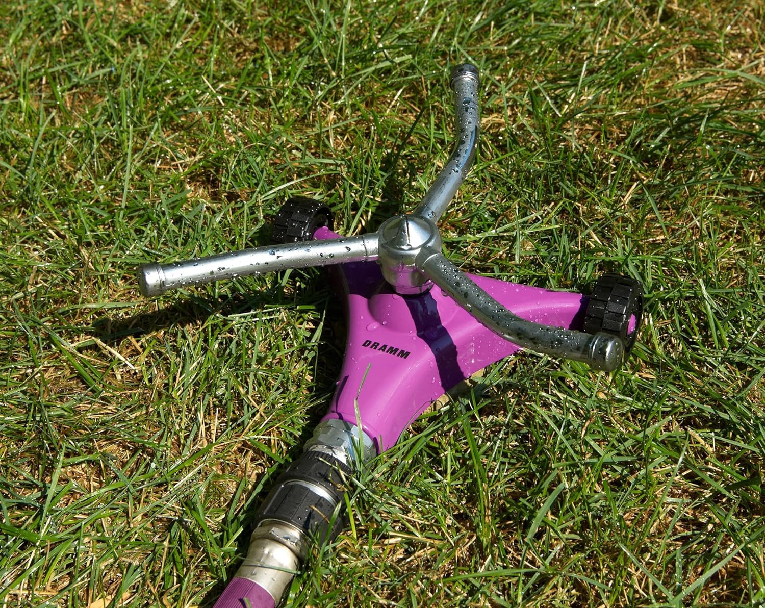 Dramm ColorStorm sprinkler in use on lawn delivering wide, uniform coverage