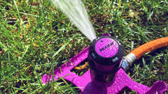 Dramm ColorStorm metal sled base close-up highlighting heavy-duty construction benefit