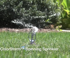 Dramm ColorStorm close-up of spinning nozzle showing fine-droplet atomized spray for efficient watering