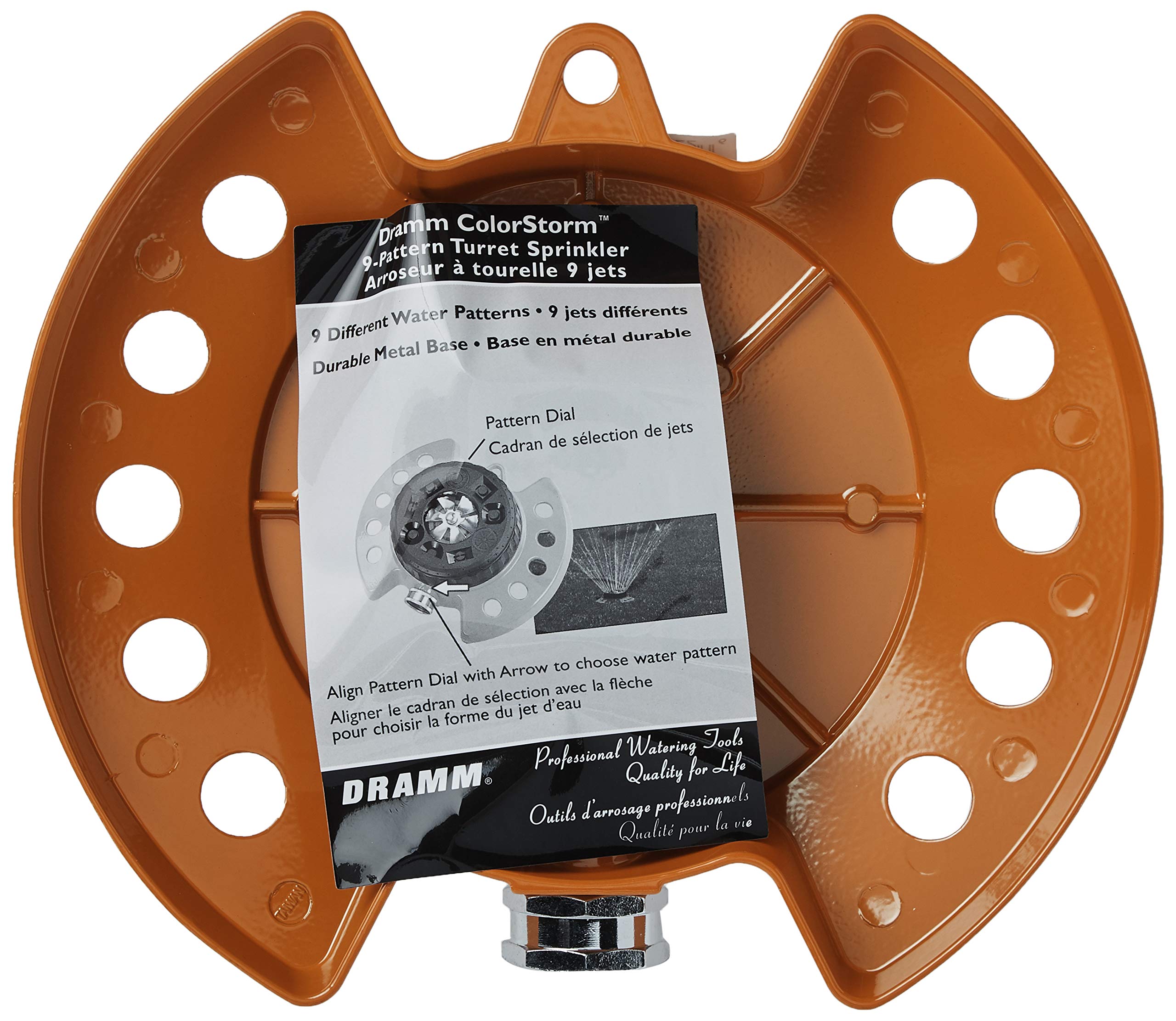 Dramm ColorStorm beside a foot for scale showing compact footprint