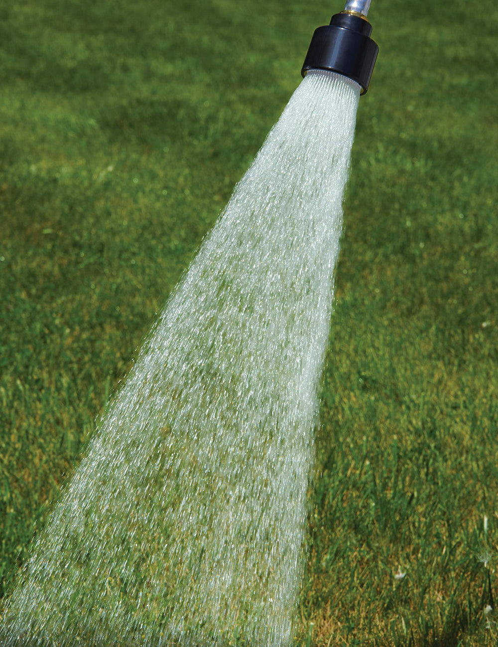 Dramm nozzle spray pattern demonstrating gentle, full-flow shower for even watering