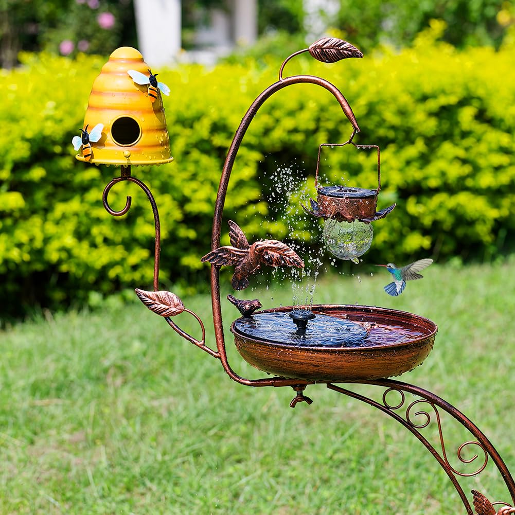 DREAMSOUL bird bath lit at dusk in garden creating warm atmosphere and focal point