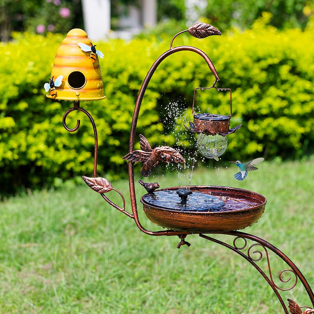 DREAMSOUL bird bath lit at dusk in garden creating warm atmosphere and focal point
