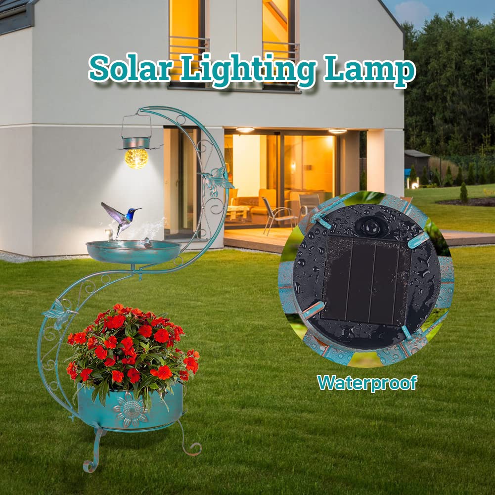 DREAMSOUL nighttime glow of birdbath providing soft ambient garden lighting