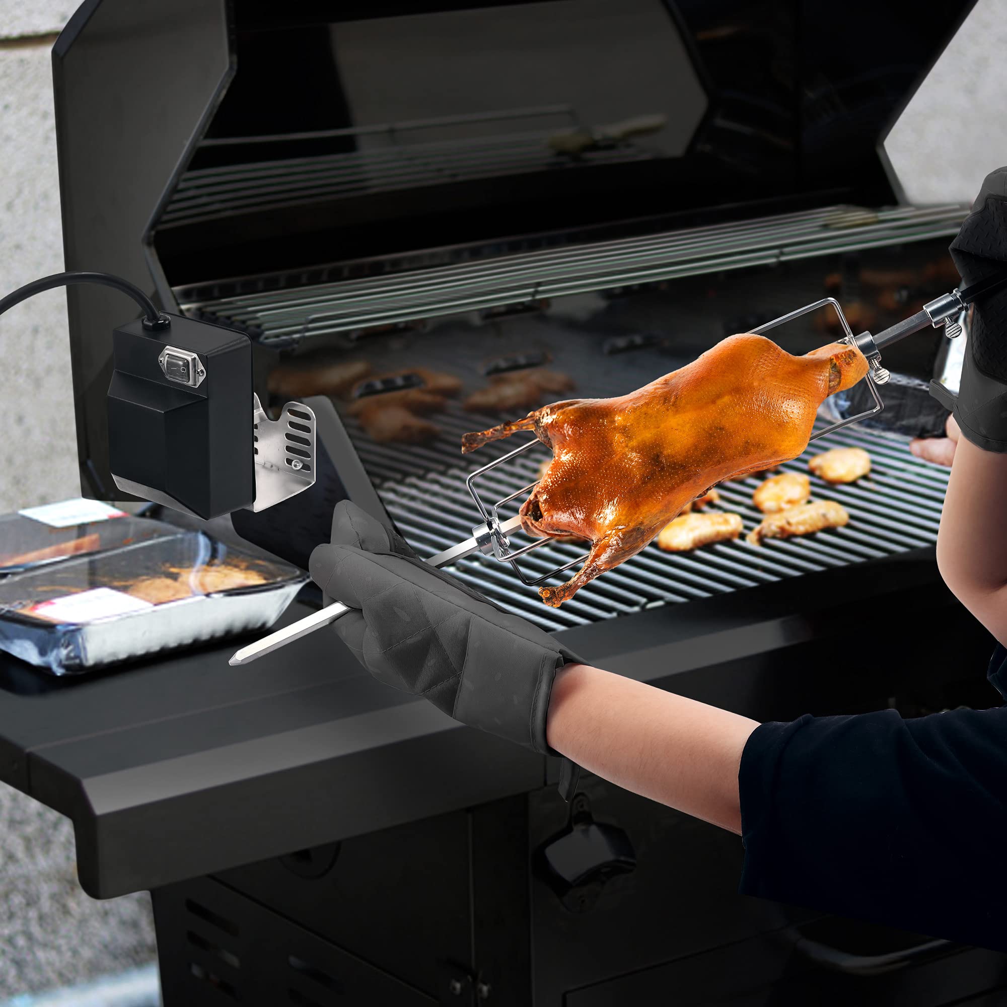 Dreyoo rotisserie installed in grill demonstrating universal fit and even roasting