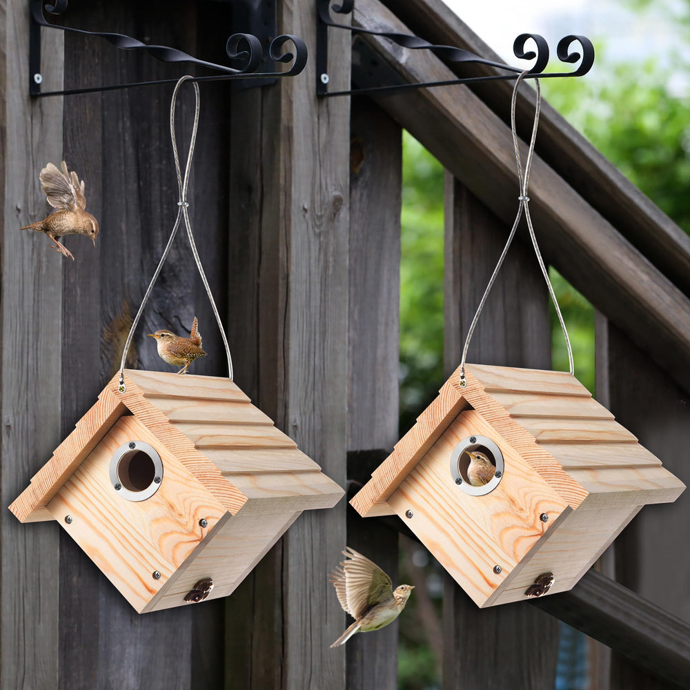 Dreyoo birdhouse held in hand for scale showing compact size and easy installation