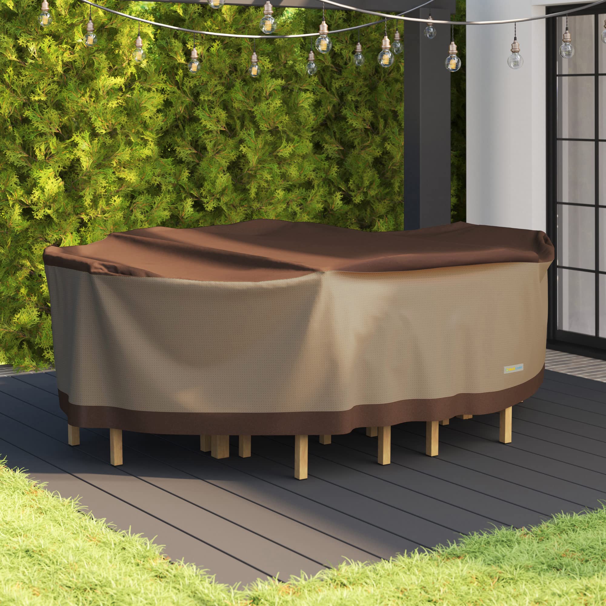 Duck Covers shielding furniture during rain demonstrating water repellency