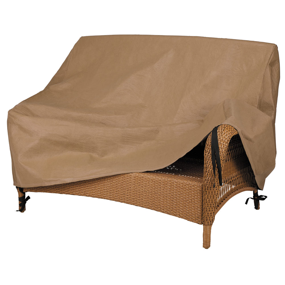 Duck Covers installed on a patio loveseat protecting cushions from weather