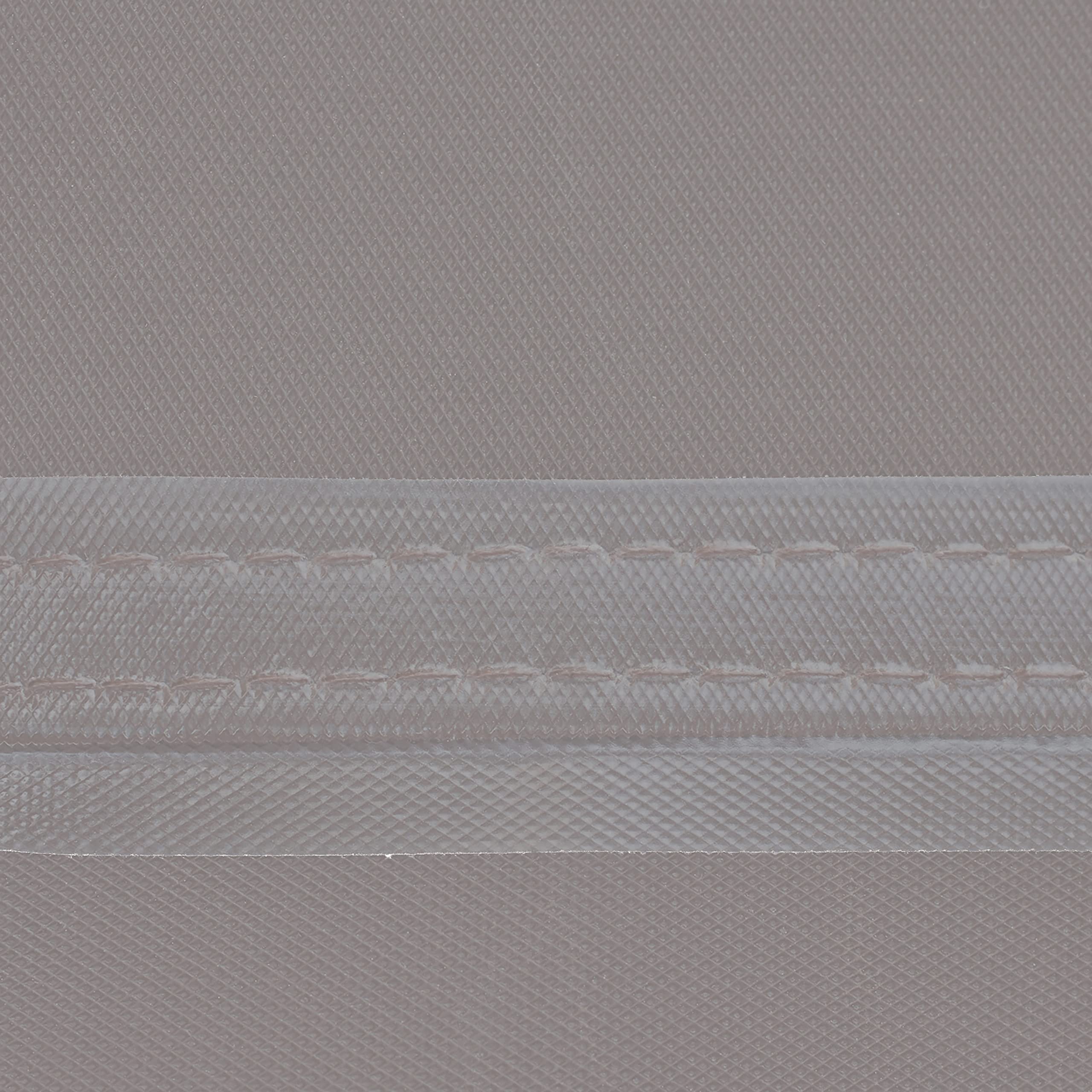 Duck Covers Soteria handle being used for easy installation and removal