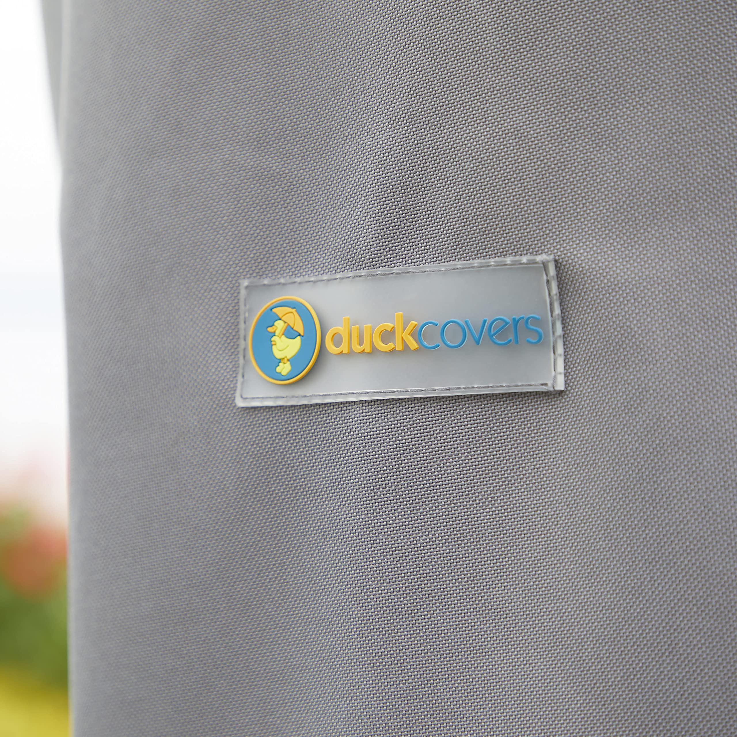 Duck Covers Soteria beside a ruler to show size and fit comparison