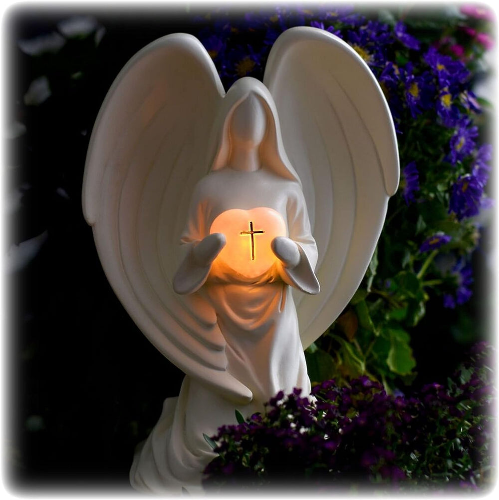 Dulaya Memories In Art front view of ivory angel statue showing comforting presence