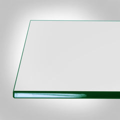 Dulles Glass placed on wood table showing protective clarity and preserved finish
