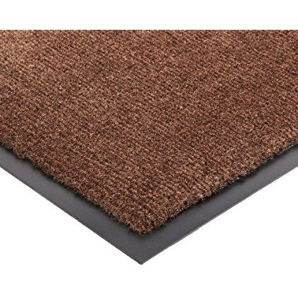 Durable Corporation mat placed in a home doorway, demonstrates slip-resistant stable placement