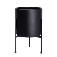 D'vine Dev front view of black cylinder planter with stand showing elegant display